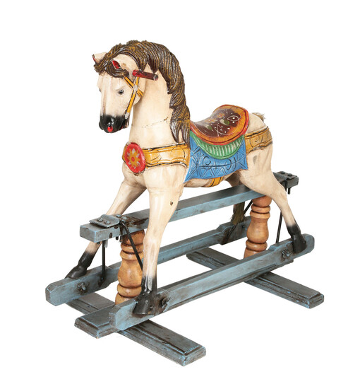 A WOOD PAINTED ROCKING HORSE