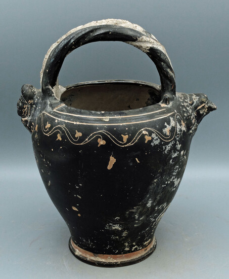 A beautiful Greek black glazed pouring vessel
