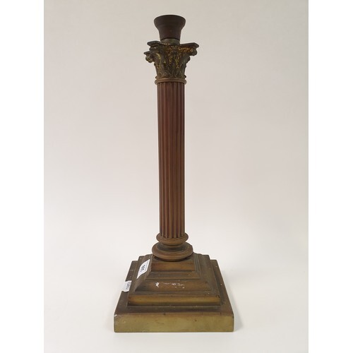 A brass lamp base, in the form of a corinthian column, 47 cm...