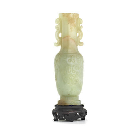 A carved jade miniature arrow vase