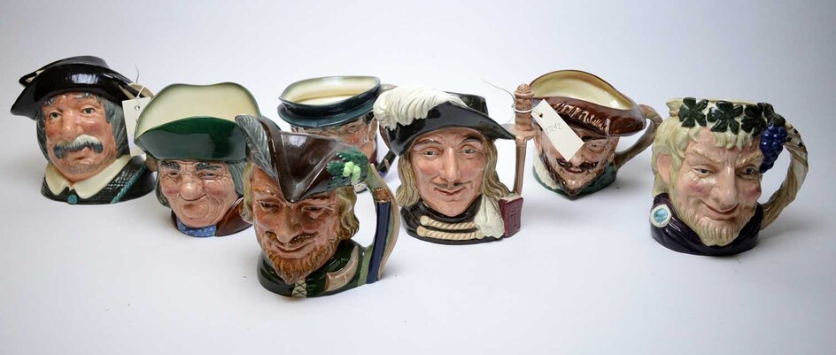 A collection of seven Royal Doulton Toby Jugs