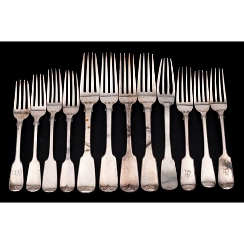 A collection of silver Fiddle pattern table and dessert fork...
