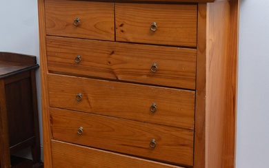A contemporary pine chest of drawers comprising two short and four long drawers 129 x 106 x 56cm