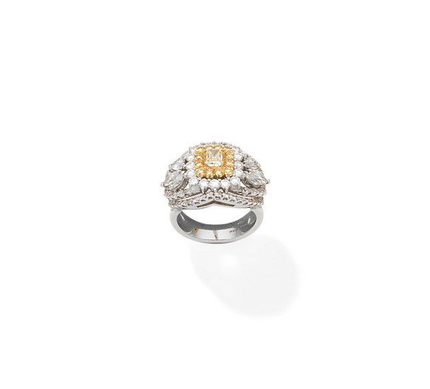 A diamond and coloured diamond dress ring
