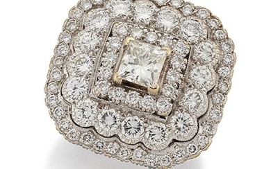 A diamond cluster ring, the princess-cut diamond...