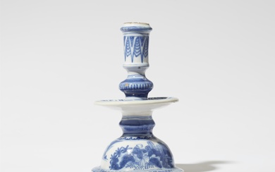 A faience candlestick with Chinoiserie decor