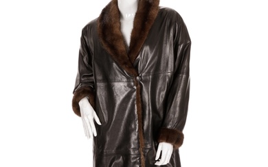 A fur-trimmed black leather coat, featuring ranch mink trim ...