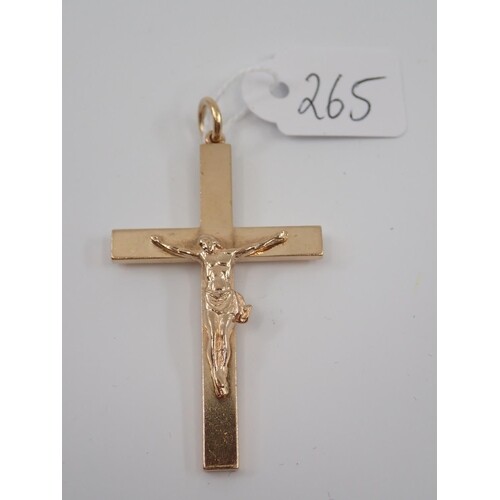 A gold cross approx. 8.2 grams