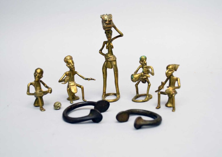 A group of West African tribal bronze figures and two currency bangles