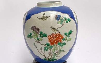 A large Chinese blue ground famille verte ginger jar, 22.5c...
