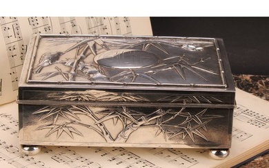 A large Chinese silver rectangular cigar box, chased with bi...