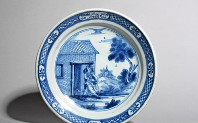 A large Delft dish 18th century, painted in...