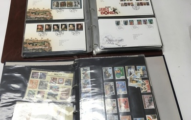A large collection of first day covers and loose stamps also...