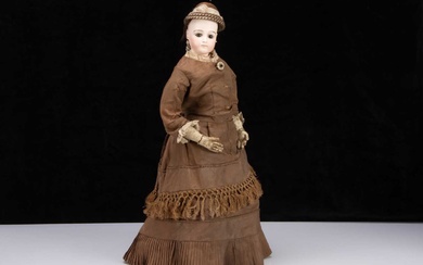 A large late 19th century Jumeau pressed bisque swivel-head fashionable doll