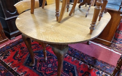 A late 19th early 20th Century D end Dining Table with cabri...