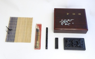 A late 20thC boxed Japanese calligraphy set, to include