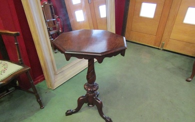 A late Victorian mahogany octagonal top wine/lamp table with...