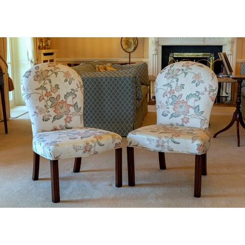 A pair of 18th century mahogany upholstered chairs, the ball...