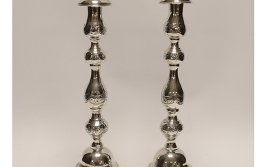 A pair of George V silver Sabbath candlesticks, by Rosenzwei...
