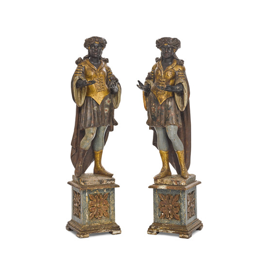 A pair of Venetian Polychrome Decorated Carved Wood Figures