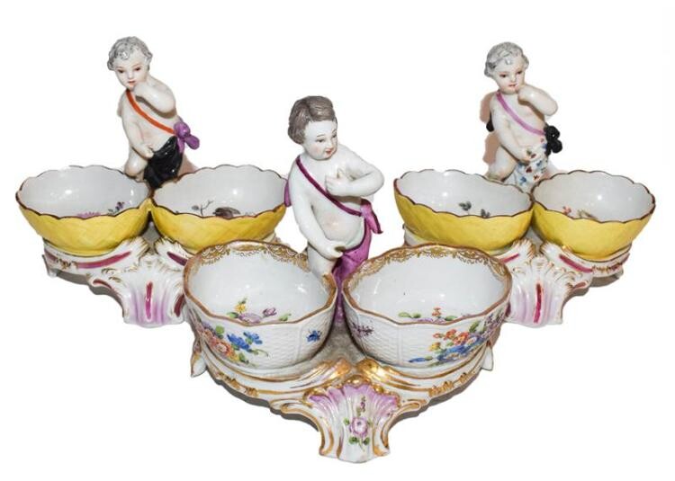 A pair of continental porcelain salts and another example (3)...