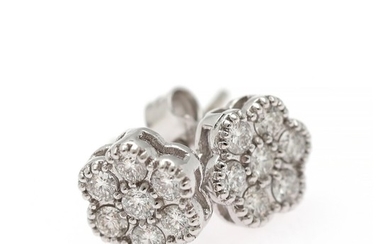 A pair of diamond ear studs each set with numerous brilliant-cut diamonds weighing a total of app. 0.39 ct., mounted in 18k white gold. Diam. app. 8 mm. (2)
