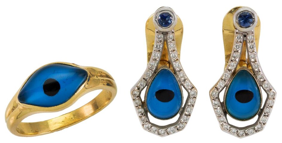 A pair of diamond earrings and a ring, each centring on a glass evil eye motif, the earrings accented with brilliant-cut diamonds, clip fittings, ring size L.