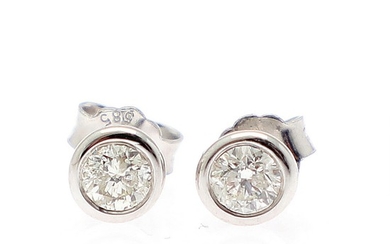 A pair of diamond solitaire ear studs each set with a brilliant-cut diamond, totalling app. 0.52 ct, mounted 14k in whitegold. (2)