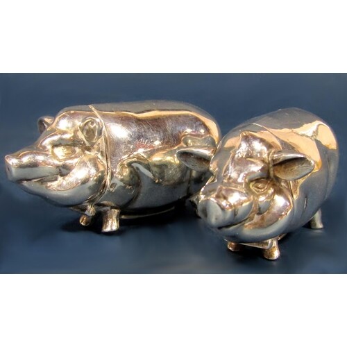 A pair of novelty 925 white metal vestas in the form of pot ...