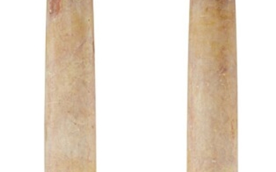 A pair of pink and yellow marble columns, 20th century