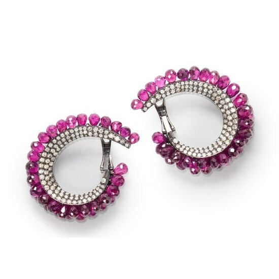 A pair of rhodolite garnet and diamond earrings