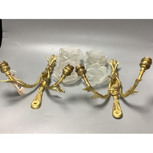A pair of two-light gilt naturalistic 'tied stem' wall lamps...