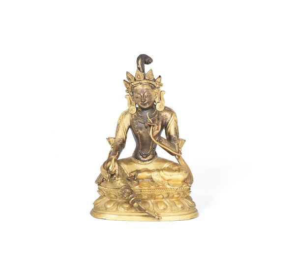 A parcel-gilt copper alloy figure of Tara
