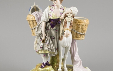 A porcelain group of a milkmaid and mule. "La Laitierre - d'Après Greuze", marked: scheibe-alsbach,...
