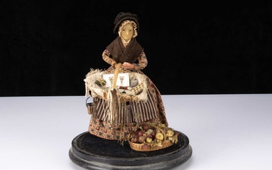 A rare 19th century beeswax pedlar doll