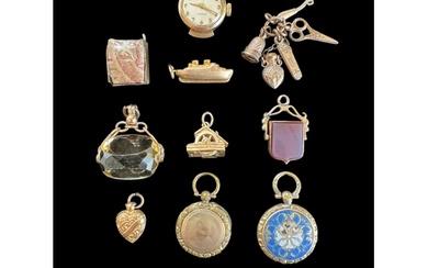 A selection of charms Comprising of a 9ct gold mounted citr...