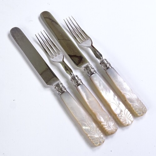A set of Victorian plated dessert knives and forks for 12 pe...