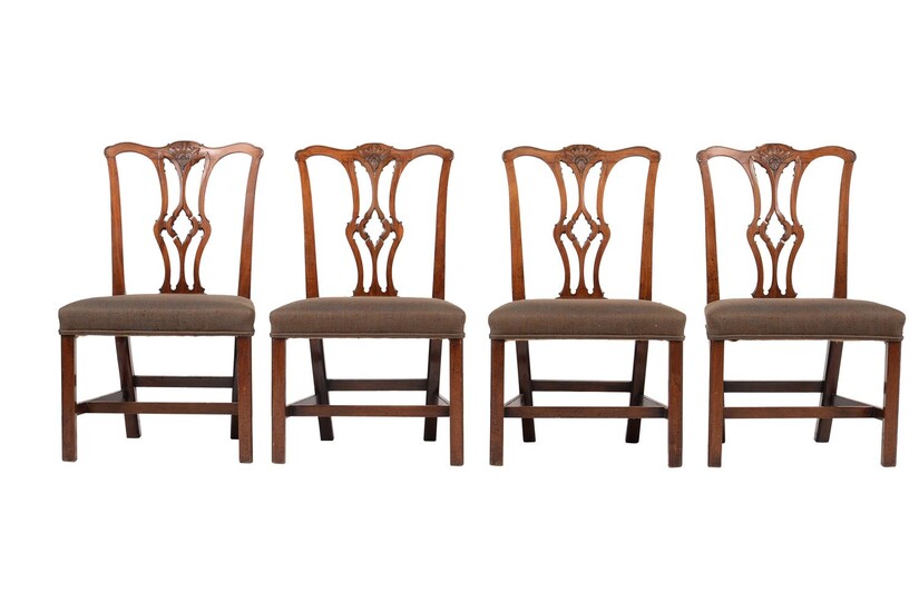 A set of four George III mahogany side chairs