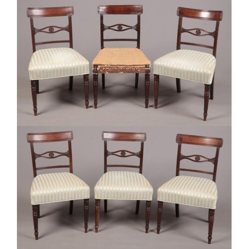 A set of six Regency mahogany dining chairs. With reeded cre...