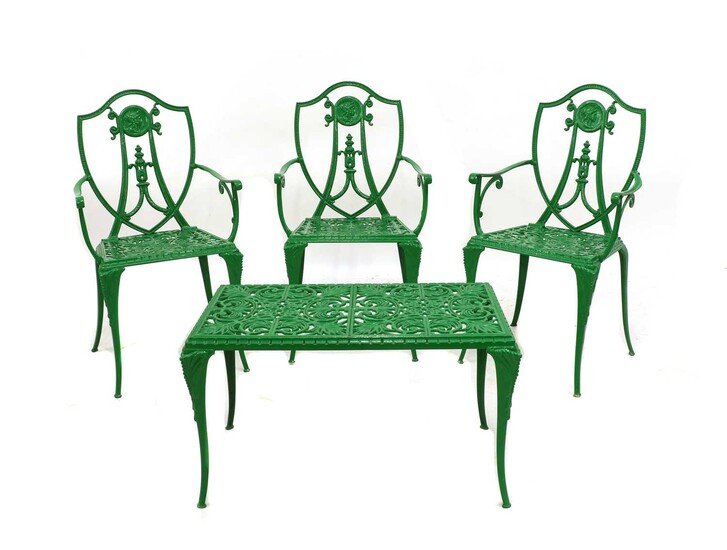 A set of three Regency-style painted aluminium garden chairs