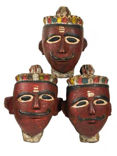 A set of three carved wood masks, Orissa, India, probably late 19th/early 20th century