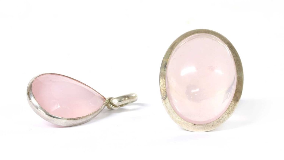 A silver rose quartz pendant and ring matched suite
