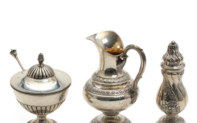 A silver sugar caster. 20th century. And a Swedish silver pitcher and...