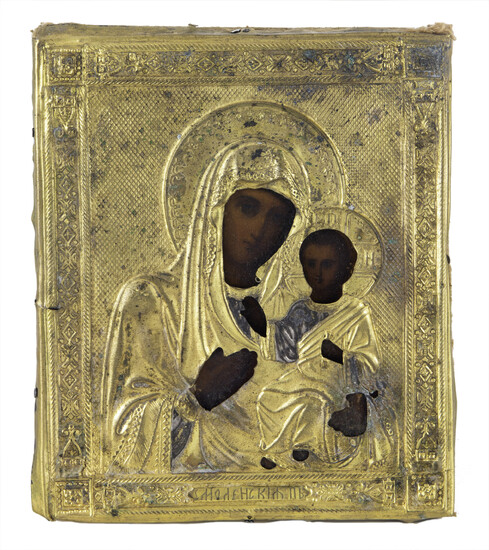 A small Russian icon of the Virgin of God within a gilt metal oklad cover