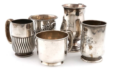 A small collection of five silver mugs, comprising:...