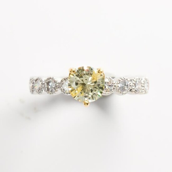 A yellow and colorless diamond fourteen karat white