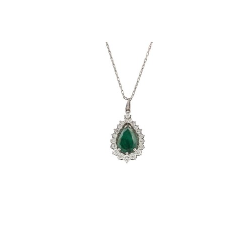 AN EMERALD AND DIAMOND CLUSTER PENDANT, mounted in 18ct gold...