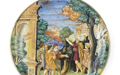 AN ITALIAN [GUBBIO] ISTORIATO MAIOLICA LUSTRED DISH FROM THE WORKSHOP OF MAESTRO GIORGIO ANDREOLI, EARLY 1530S AENEAS AND ACHATES LEAVING THEIR FRIENDS TO EXPLORE THE COAST OF LIBYA