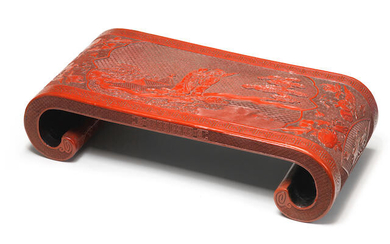 AN UNUSUAL CINNABAR LACQUER CARVED SCROLL-SHAPED STAND