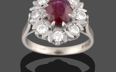 An 18 Carat White Gold Ruby and Diamond Cluster Ring,...